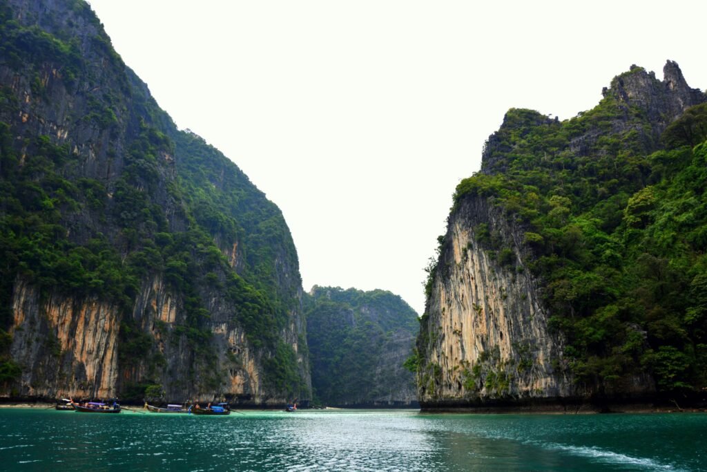 Stunning view of towering limestone cliffs and tropical waters in Krabi, Thailand.